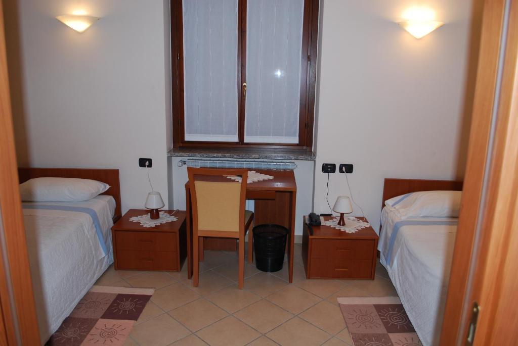 מריאנו קומנסה Albergo Sole חדר תמונה